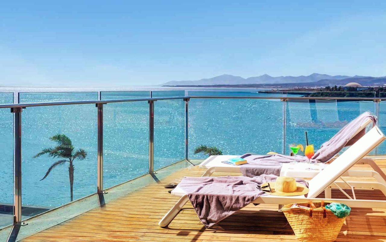 Arrecife Gran Hotel & Spa Экстерьер фото A glass balustrade